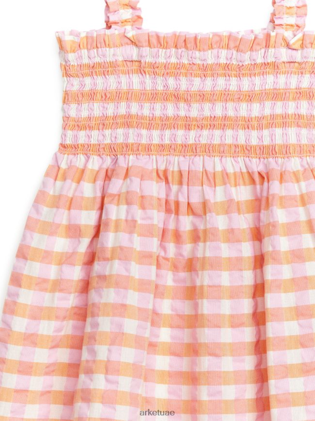 ملابس عبد اللطيف ARKET أطفال فستان قطني مدخن برتقالي/محدد BXB8481376